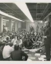 Monsignor Rice Address Sitting Students Photograph
